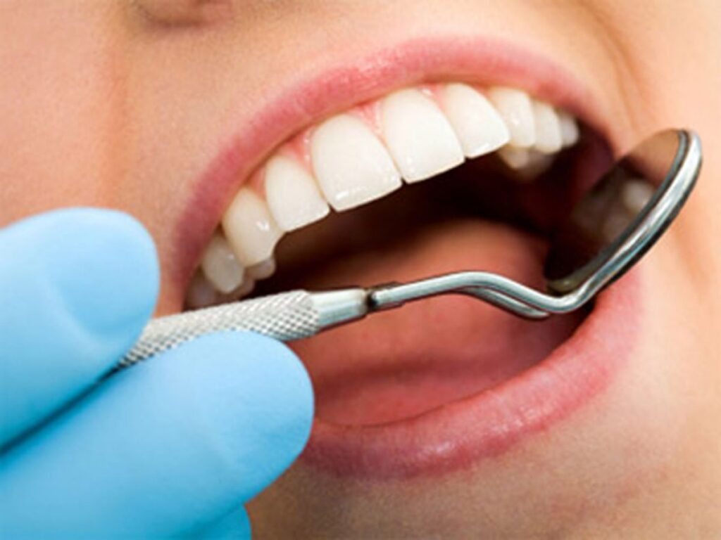 درمان درد دندان پر شده به چه صورت است؟